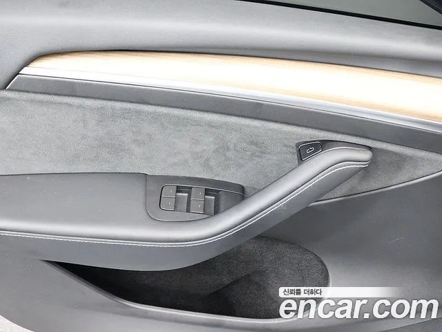 Tesla Model Y — Фото автомобиля 10