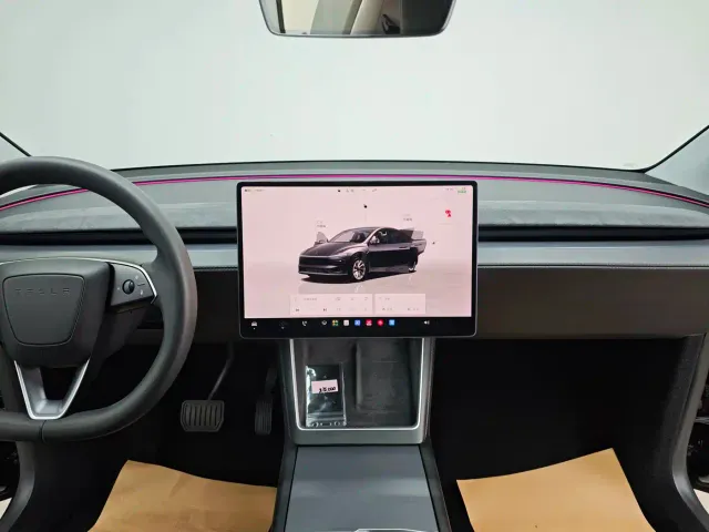 Tesla Model Y — Фото автомобиля 14