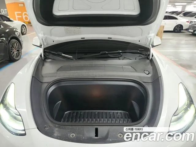 Tesla Model Y — Фото автомобиля 7