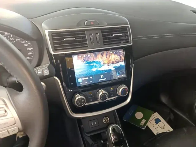 Nissan Tiida — Фото автомобиля 12
