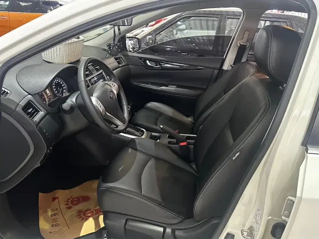 Nissan Tiida — Фото автомобиля 7