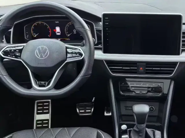 Volkswagen Tiguan L — Фото автомобиля 9