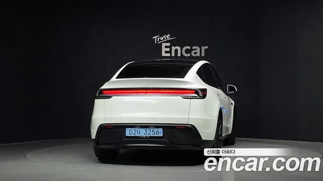 Tesla Model Y — Фото автомобиля 4