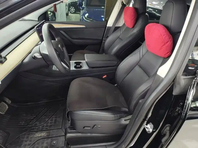 Tesla Model Y — Фото автомобиля 14