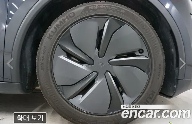 Tesla Model Y — Фото автомобиля 9