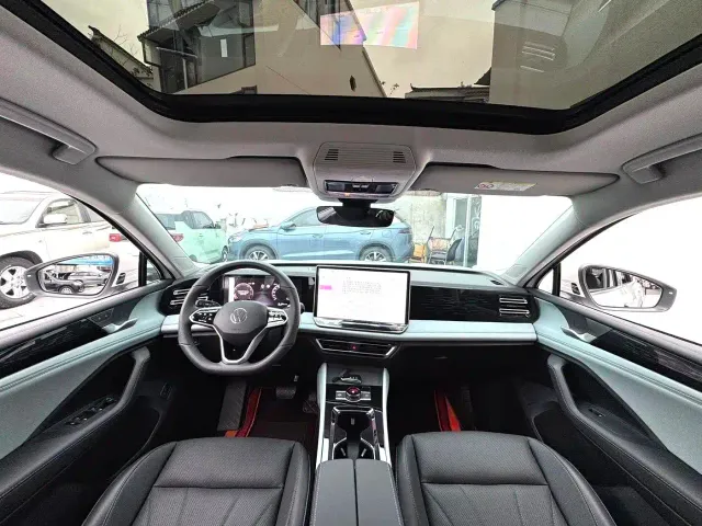 Volkswagen Tiguan L — Фото автомобиля 5