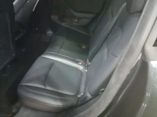 Tesla Model Y — Фото автомобиля 16