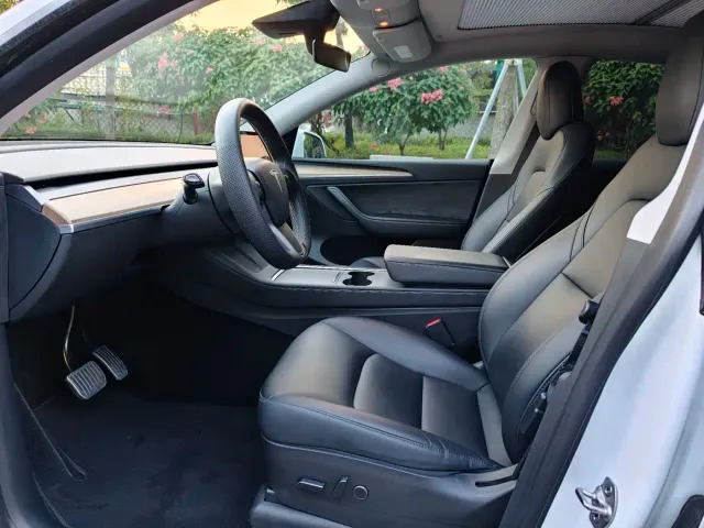 Tesla Model Y — Фото автомобиля 8