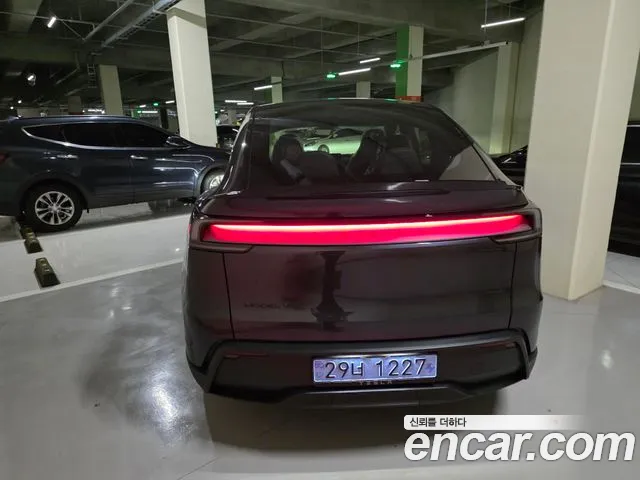 Tesla Model Y — Фото автомобиля 2