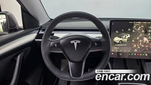 Tesla Model Y — Фото автомобиля 18