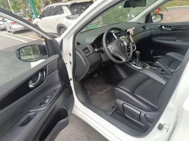 Nissan Tiida — Фото автомобиля 13