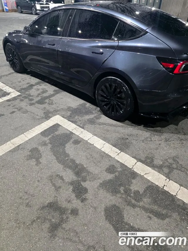 Tesla Model 3 — Фото автомобиля 6