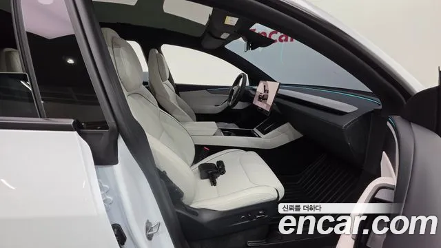 Tesla Model Y — Фото автомобиля 15