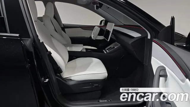 Tesla Model Y — Фото автомобиля 16