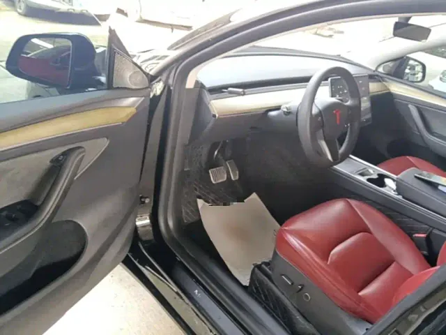 Tesla Model Y — Фото автомобиля 15