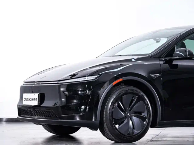 Tesla Model Y — Фото автомобиля 3