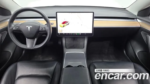 Tesla Model 3 — Фото автомобиля 10