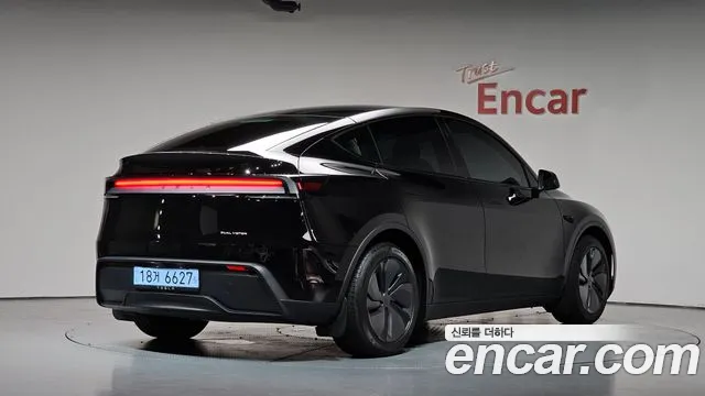 Tesla Model Y — Фото автомобиля 2