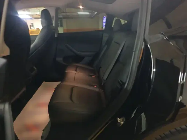 Tesla Model Y — Фото автомобиля 16