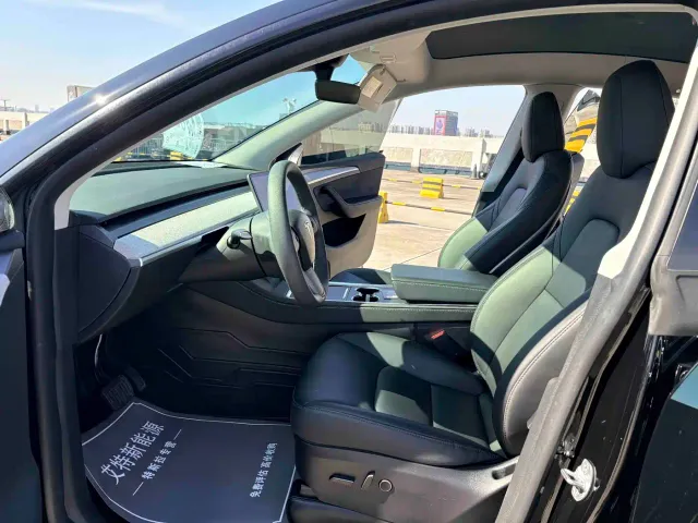 Tesla Model Y — Фото автомобиля 14