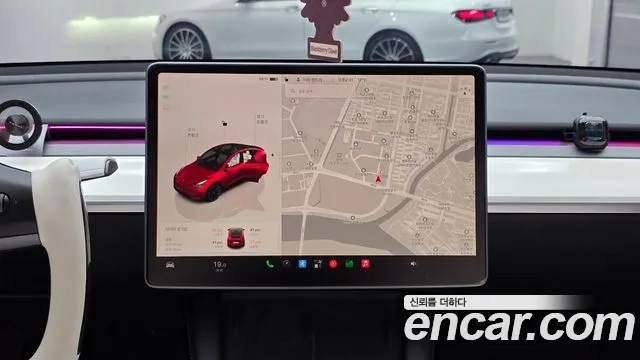 Tesla Model Y — Фото автомобиля 18