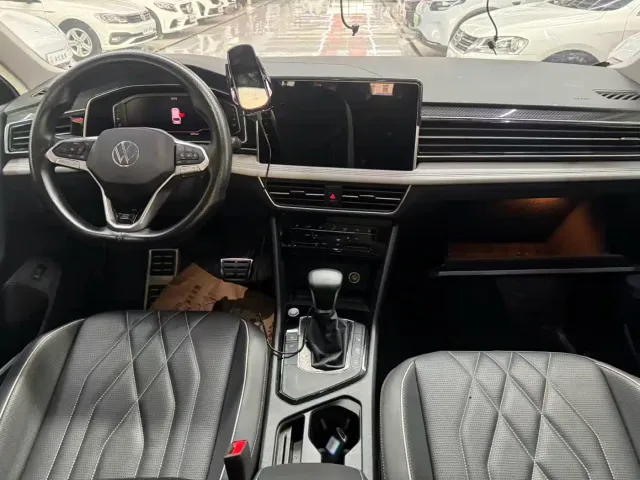 Volkswagen Tiguan L — Фото автомобиля 5