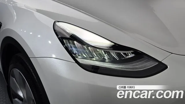 Tesla Model Y — Фото автомобиля 7