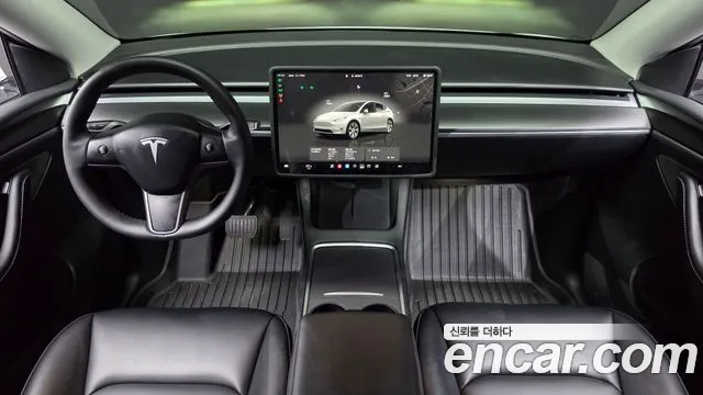 Tesla Model Y — Фото автомобиля 7