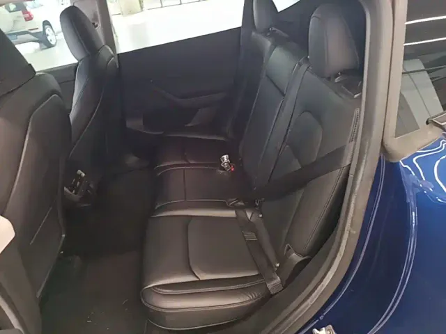 Tesla Model Y — Фото автомобиля 16