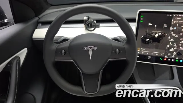Tesla Model Y — Фото автомобиля 12