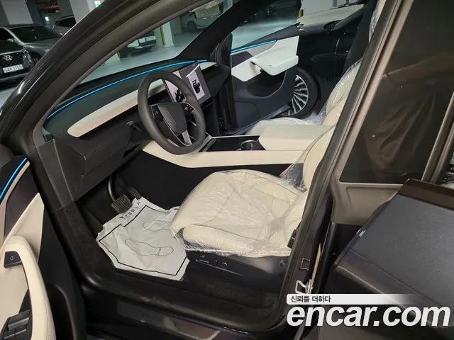 Tesla Model Y — Фото автомобиля 7