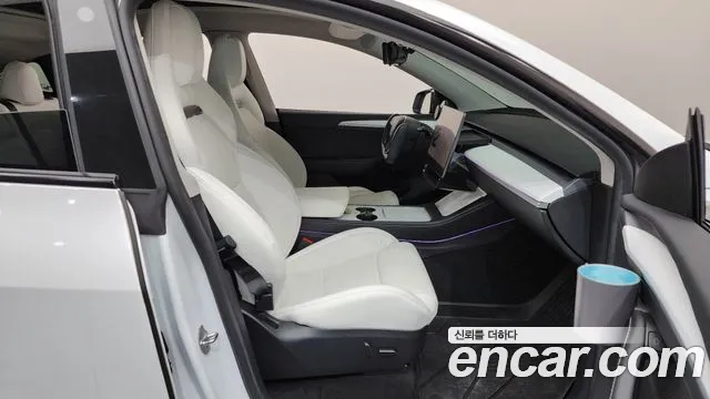Tesla Model Y — Фото автомобиля 25