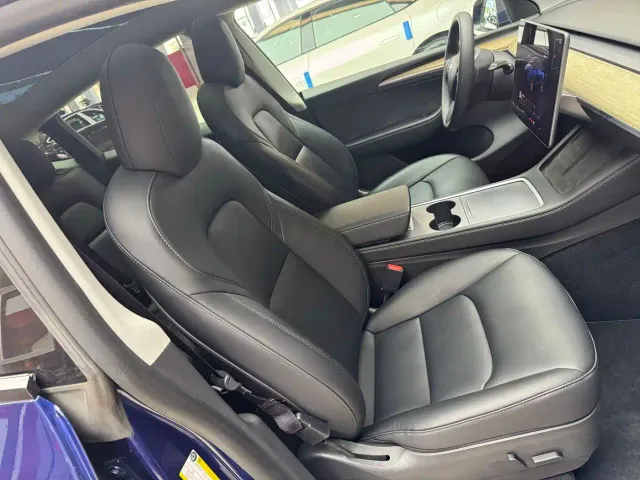 Tesla Model Y — Фото автомобиля 12