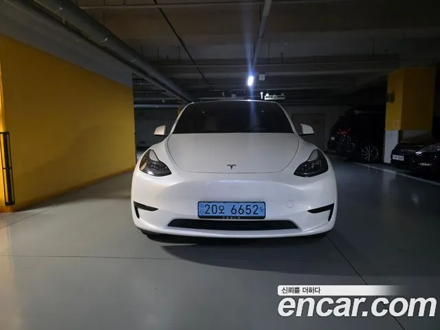Tesla Model Y — Фото автомобиля 2