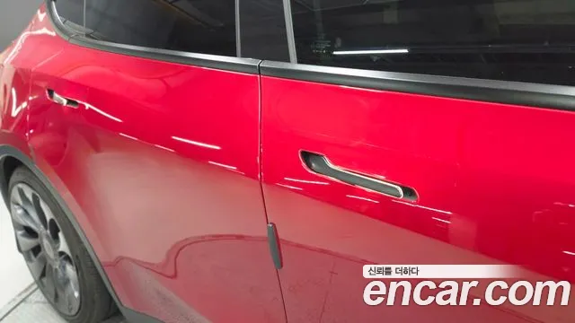 Tesla Model Y — Фото автомобиля 16