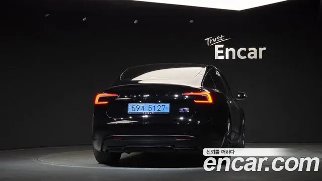 Tesla Model 3 — Фото автомобиля 4