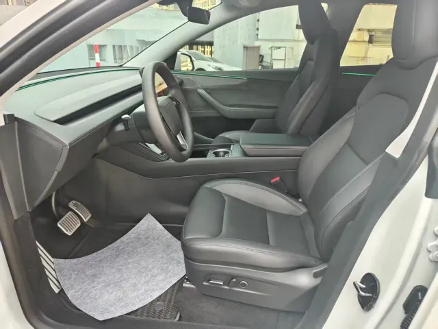 Tesla Model Y — Фото автомобиля 6