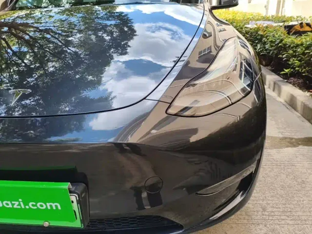 Tesla Model Y — Фото автомобиля 23