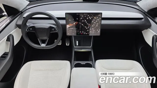 Tesla Model Y — Фото автомобиля 7