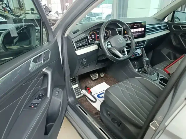 Volkswagen Tiguan L — Фото автомобиля 15