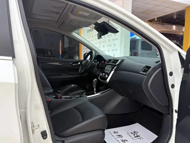 Nissan Tiida — Фото автомобиля 19