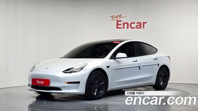Tesla Model 3 — Фото автомобиля 11