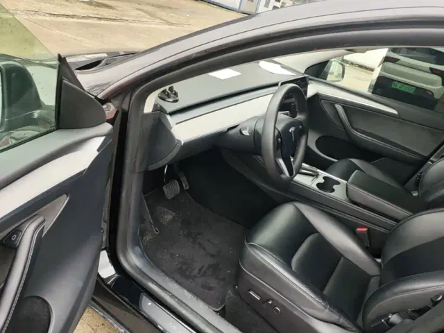 Tesla Model Y — Фото автомобиля 15