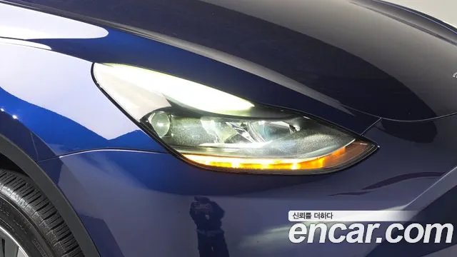 Tesla Model Y — Фото автомобиля 7