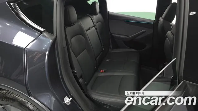 Tesla Model Y — Фото автомобиля 18