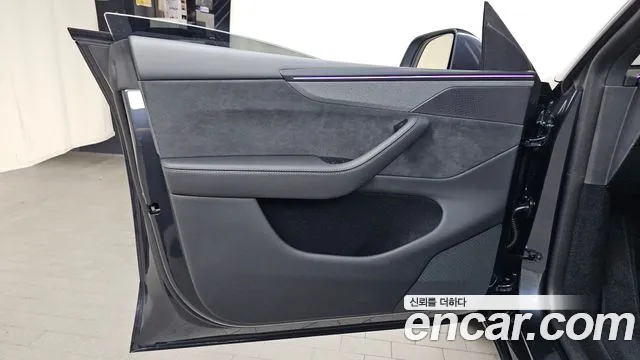 Tesla Model Y — Фото автомобиля 23