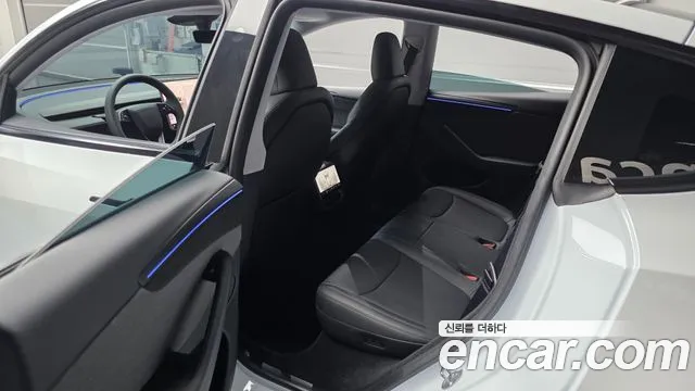 Tesla Model Y — Фото автомобиля 9