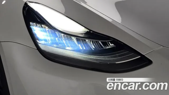 Tesla Model Y — Фото автомобиля 18