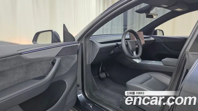 Tesla Model Y — Фото автомобиля 15