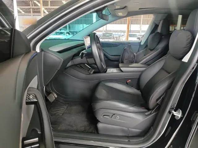 Tesla Model Y — Фото автомобиля 14